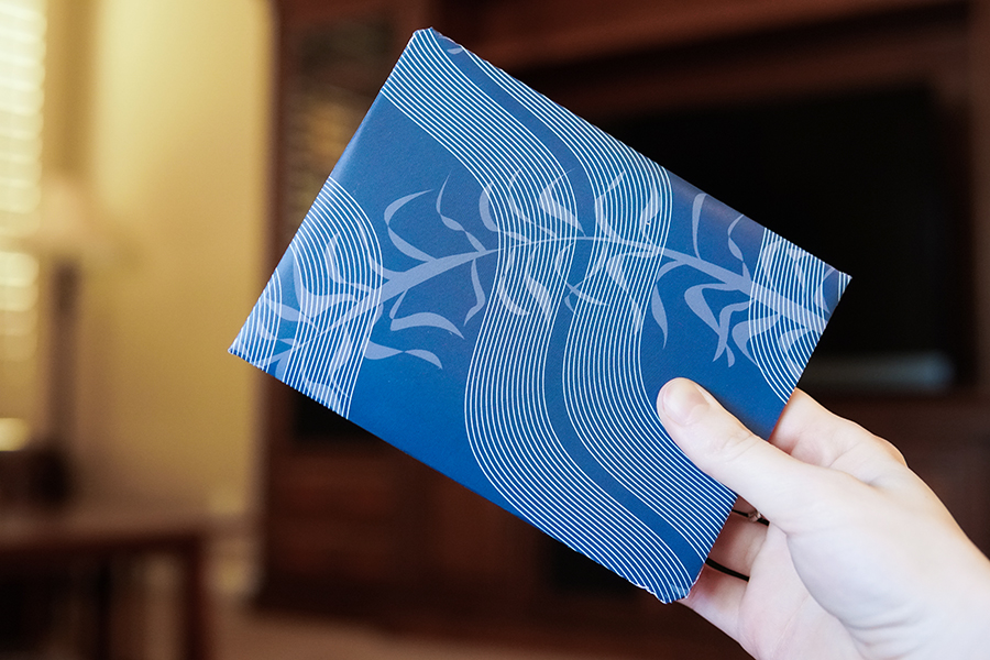 the back side of the blue and white hydrosphere aquarium envelope