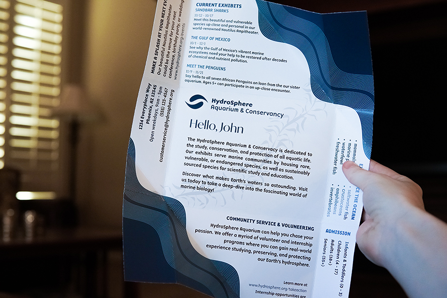 the hydrosphere aquarium flyer/envelope hybrid opened fully showing the flyer content