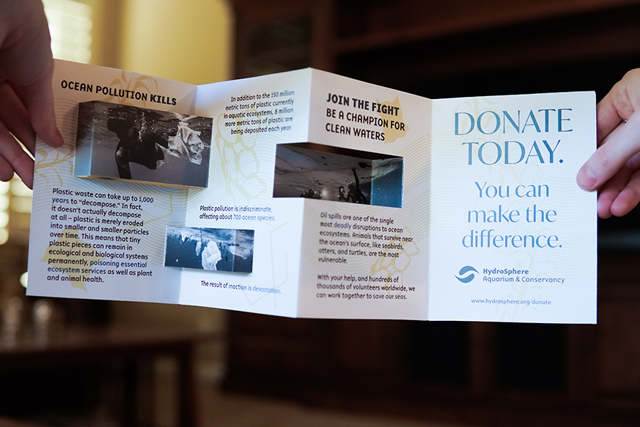 the back side of the pop-out hydrosphere aquarium brochure