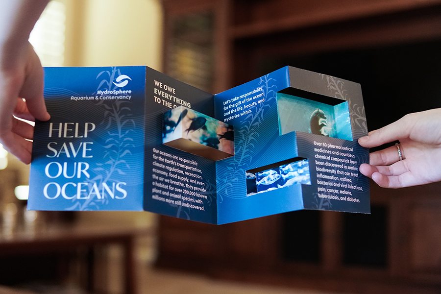 the front side of the pop-out hydrosphere aquarium brochure